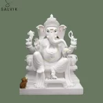 white dhoti ganpati murti